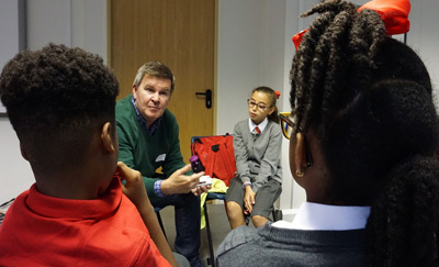 Danny Freeman talks to children about his time as a cabbie